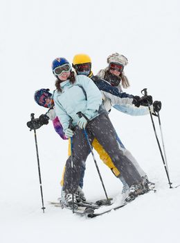 Skiers having fun in the blizzard