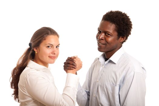 a young team holding hands looking at the camera