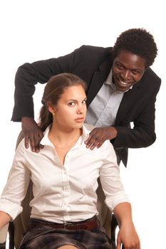 young woman beeing  touched by a fellow coworker