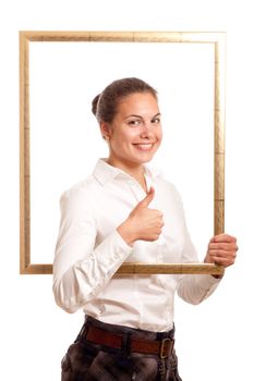 a young businesswoman holding looking through a pictureframe showing thumb up