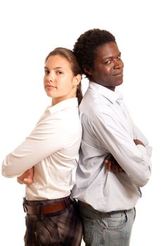 a young team or couple standing with their back to each other looking confident