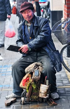  Chinese worker in Shanghai street