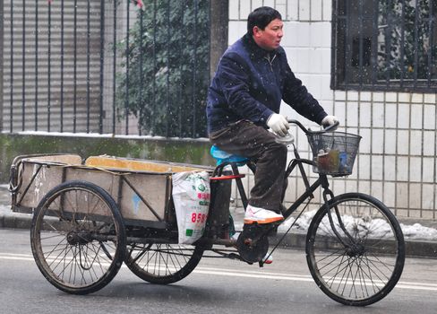 Chinese street in shanghai in snowy day