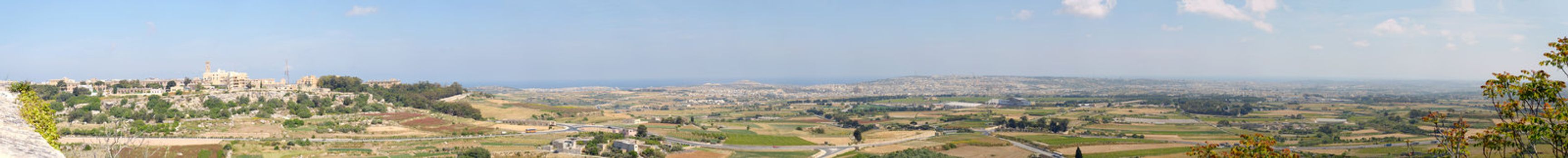 180 degree of highly detailed panorama of Northern part of Malta as seen from the battlements of Mdina. The image is stitched from 24 individual exposures, each shot at 55mm. One can see Mosta with its famous dome and even Valletta.
