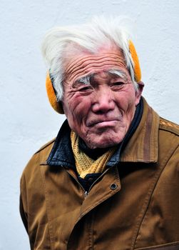 Portrait of old Chinese man in Shanghai China