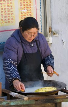  Chinese food seller in the street of Shanghai China