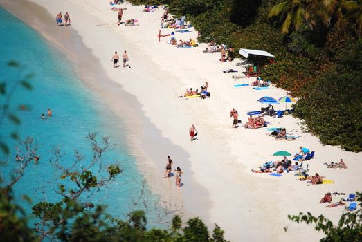 Bathers enjoy warm Caribbean waters.