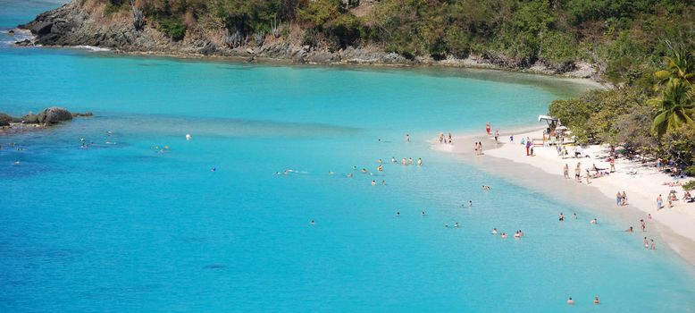 Bathers enjoy warm Caribbean waters.