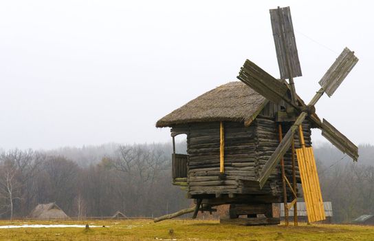 windmill in ukranian village at winter time