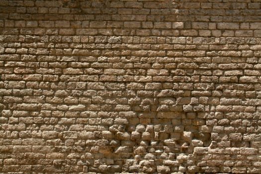 background or pattern of a broken brick stone wall, historic european church