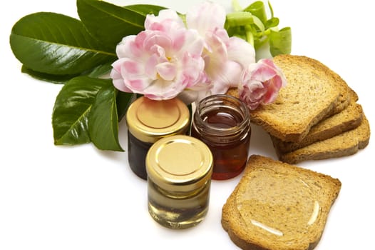 Italian Honey of different qualities on white background