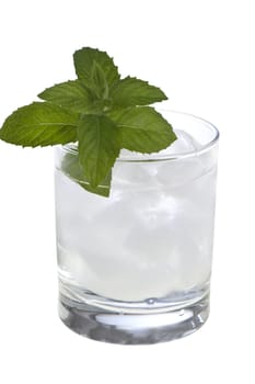 A glass of mint leaves with water and ice