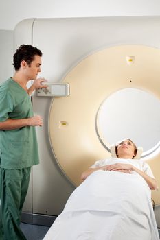 A patient and CT Scan Technician preparing for an x-ray