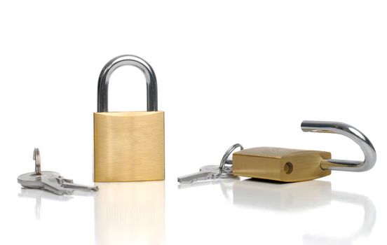 Two security gold locks and keys on white background.