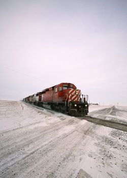 Diesel engine approaching road crossing in winter