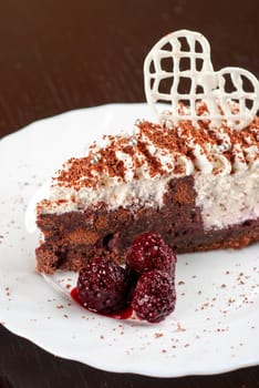 fresh tasty baked blackberry cake closeup at white plate