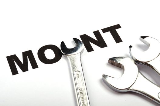 mount or mounting concept with tool and word