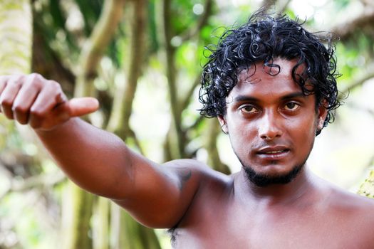 Portrait young men on a green background. Sri Lanka