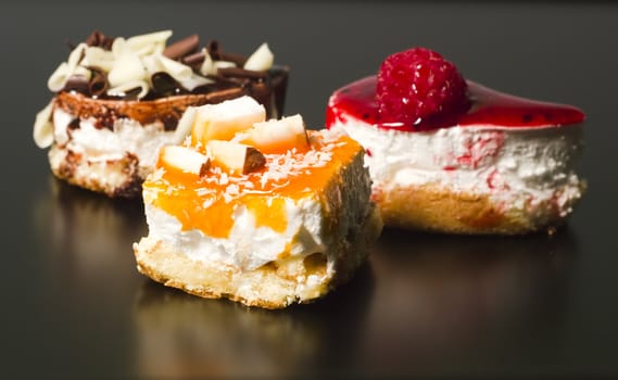 Composition of creative yogurt desserts topped with a variety of flavors