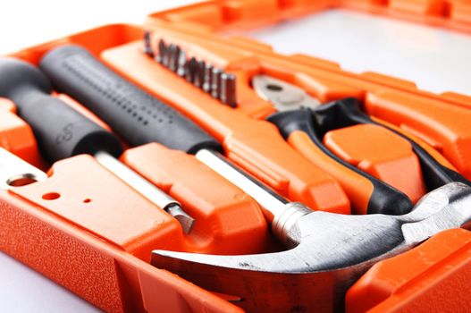 toolbox kit with hammer and screwdriver showing construction concept