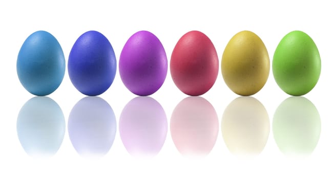 Colored eggs on a white background with reflections on the basis