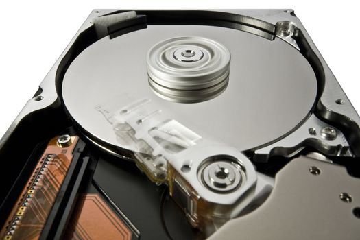 rotating hard disk on white in extreme perspective with moving read write head