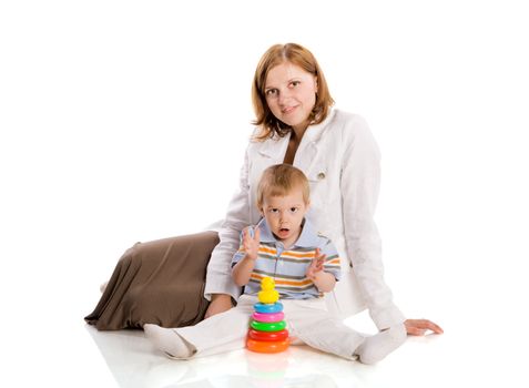 Mother with two years son posing isolated on white