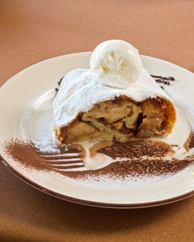 apple strudel tasty dessert dish at plate closeup