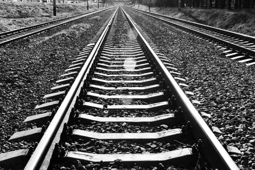 A railroad that goes afield. Khmelnytsky, Ukraine. Black and white