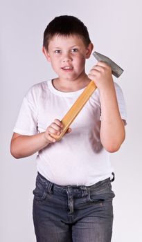 Portrait of emotionally kid. Funny little boy. Beautiful caucasian model.