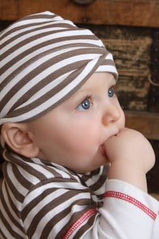 Cute baby boy with big blue eyes