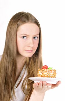 young cute girl with a tasty cake isolated on 