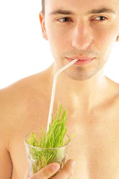  Portrait of man having grass cocktail symbolizing healthy food