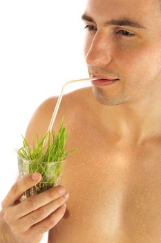  Portrait of man having grass cocktail symbolizing healthy food