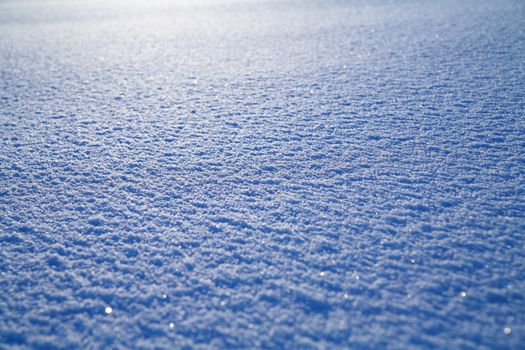 Details of a beautiful snow surface perfect for backgrounds on greeting cards etc.