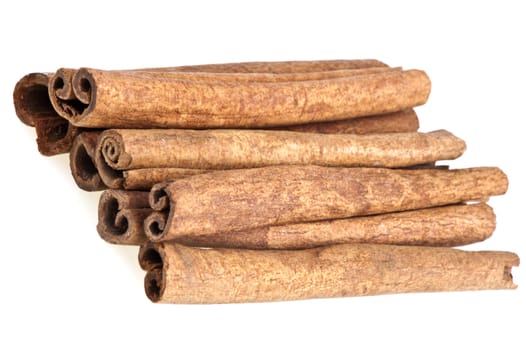 some cinnamon sticks on a white background