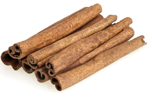 some cinnamon sticks on a white background