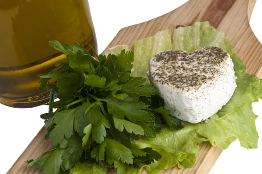 Small portion of goat cheese flavored with herbs and spices
