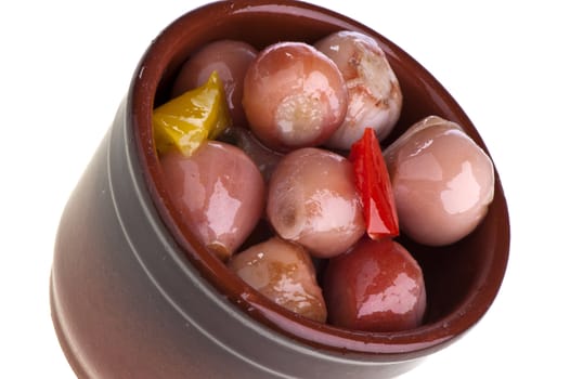 onions in oil with pieces of bell pepper