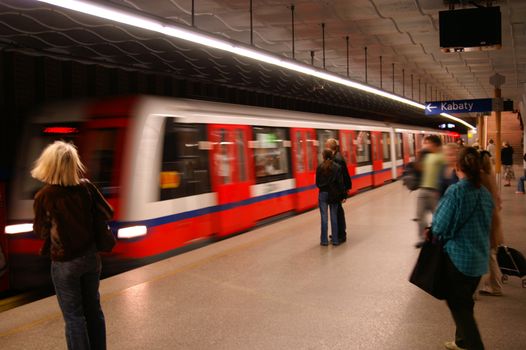 Subway arriving at station from Warsaw