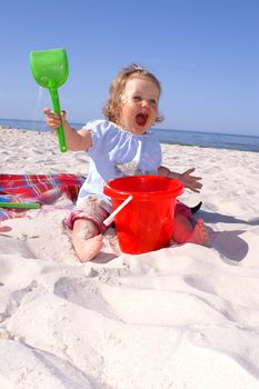 babygirl exult on the beach