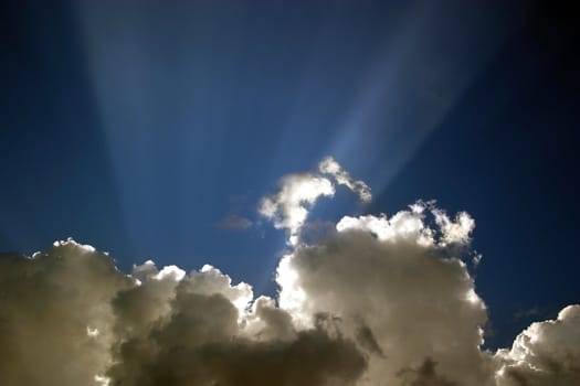 The image of a cloud with beams