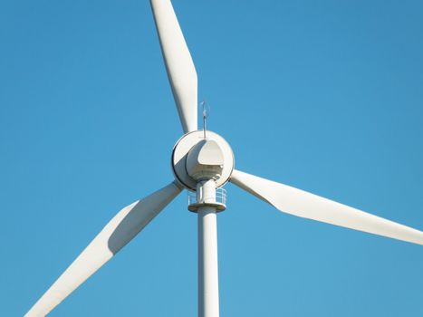 Wind turbine on a clear blue sky