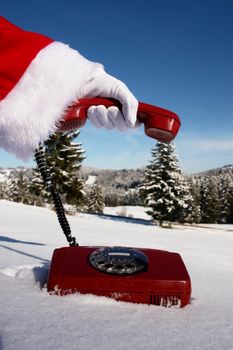 Santa Claus Hotline symbolized by a red retro phone