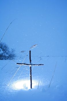 Cross in winterscene