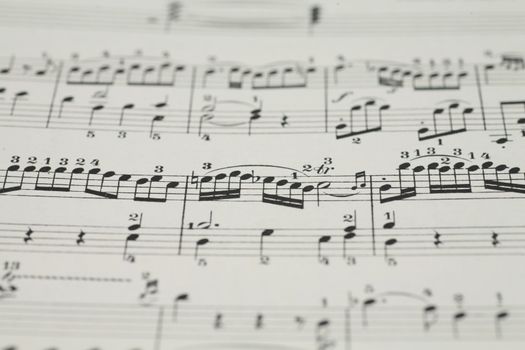 close-up of an old music sheet, very shallow DOF!