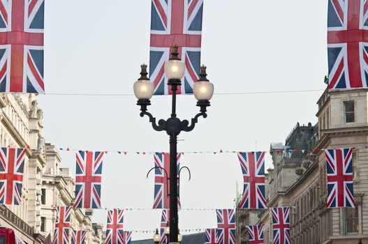 LONDON - APRIL 24: Central London hangs up buntings for Prince William and Catherine Middleton's royal wedding celebration to take place April 29 at Westminster Abbey. April 24, 2011 in London, England.