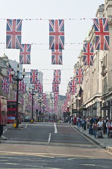 LONDON - APRIL 24: Central London hangs up buntings for Prince William and Catherine Middleton's royal wedding celebration to take place April 29 at Westminster Abbey. April 24, 2011 in London, England.