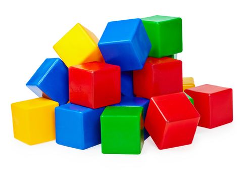 A small handful of children's toy blocks on a white background