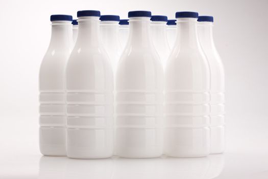 food series: white plastic milk bottle over white